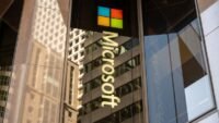 A digital shield protecting a network, symbolizing cybersecurity and AI's role in Microsoft Patch Tuesday updates.