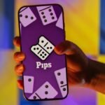 A screenshot of the NYT Pips game board showing various color-coded domino tiles and conditions.