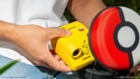 A collection of Polaroid instant cameras featuring Pikachu, Sylveon, and Poké Ball designs, along with themed film and accessories.