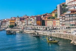 Portugal in 2026: Unveiling the Best Destinations from Lisbon to the Douro Valley 3 Diverse landscapes of Portugal, featuring Lisbon's tiled hills, Porto's riverside, Sintra's palaces, Algarve's beaches, and Douro Valley vineyards.