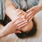 A person experiencing dizziness or lightheadedness, symbolizing the symptoms of Postural Orthostatic Tachycardia Syndrome (POTS).