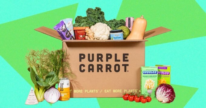 A vibrant, freshly prepared vegan meal from Purple Carrot, showcasing colorful vegetables and herbs.