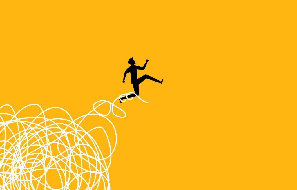 Beyond the Balance Sheet: How Losing a Client Rewired Our Remote Firm for Trust 3 A person looking thoughtfully at a laptop screen, representing remote work challenges in client relations.