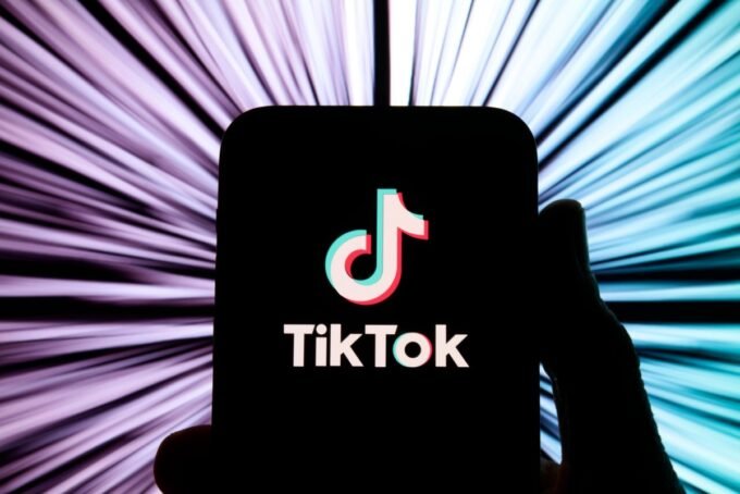 TikTok logo with payment icons, symbolizing the platform's expansion into peer-to-peer financial services.