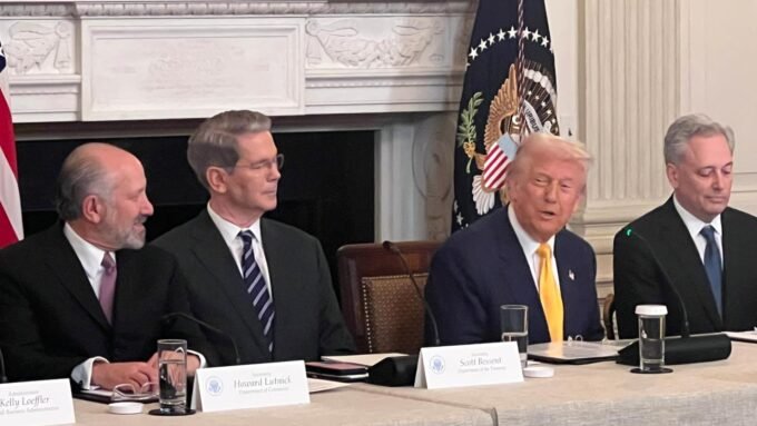 Former President Donald Trump shaking hands with a group of cryptocurrency CEOs at a White House meeting.