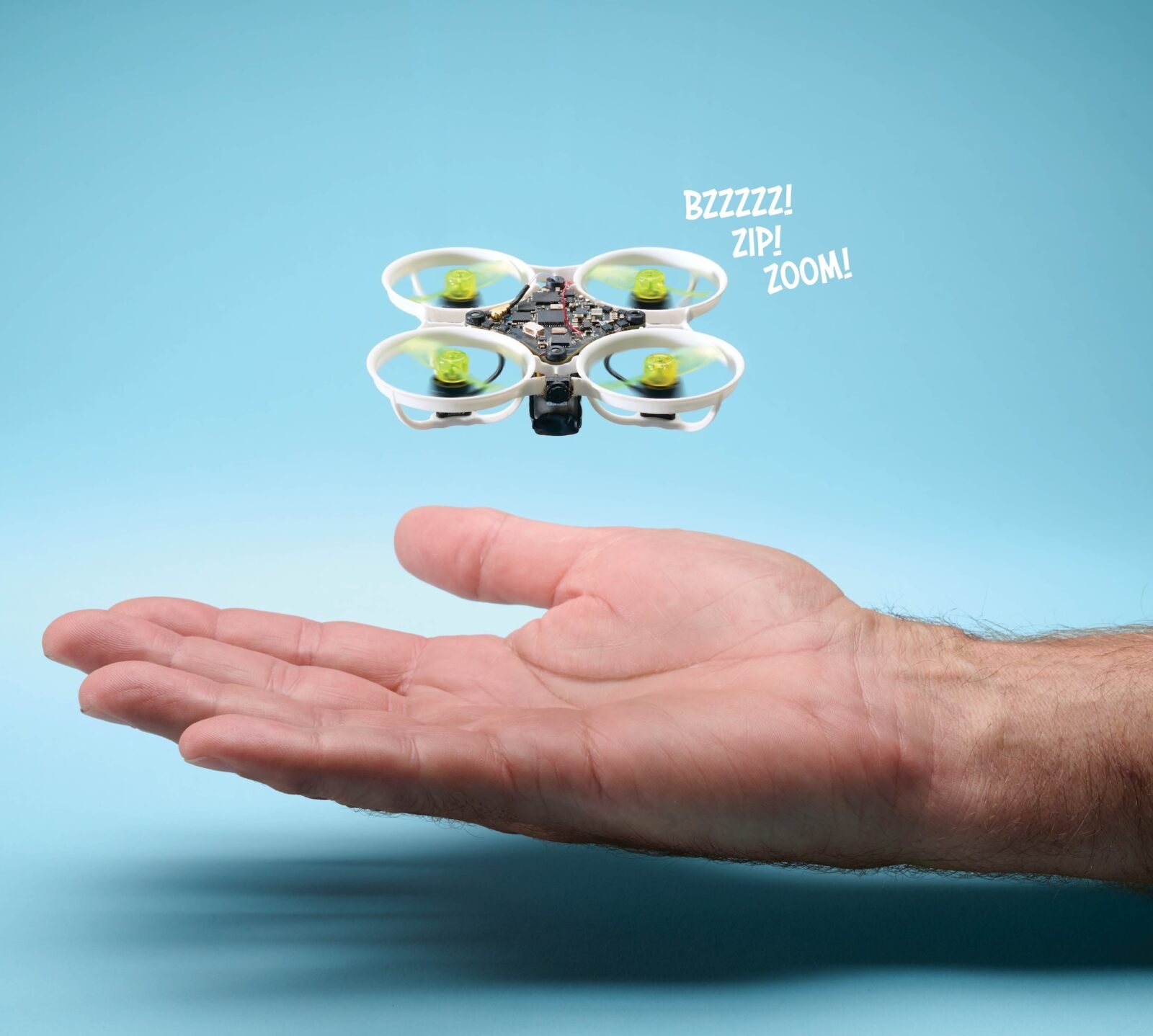 A remarkably lightweight 65mm FPV whoop drone with ducted propellers, ready for flight.