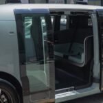 Amazon Zoox autonomous robotaxi driving on a street in Las Vegas