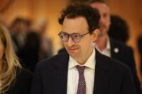 President Donald Trump and Anthropic CEO Dario Amodei, symbolizing the intersection of AI and government policy.