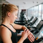 A person with asthma engaging in light everyday physical activity, such as walking or taking stairs, symbolizing accessible exercise.