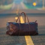 A diverse collection of top-rated weekend bags and duffels, suitable for various travel styles, as recommended by Consumer Reports.