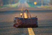 A diverse collection of top-rated weekend bags and duffels, suitable for various travel styles, as recommended by Consumer Reports.