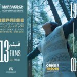 Vue intérieure de la Cinémathèque marocaine, avec des sièges rouges et un écran de projection, invitant à la découverte cinématographique.