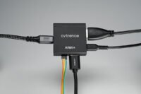 Cytrence Kiwi+ device connected to a Raspberry Pi and a laptop, demonstrating its KVM functionality.