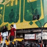 صورة للرئيس الأمريكي دونالد ترامب يتحدث في مؤتمر صحفي