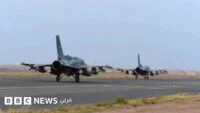صورة تظهر آثار الصراع في اليمن، مع التركيز على الجانب الإنساني والعسكري.