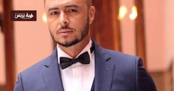 صورة تظهر الإعلامي هشام مسرار في سيارته قبل وقوع حادث سير مفاجئ