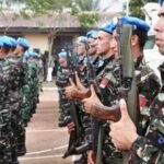 صورة لممثلين عن دول إفريقية في اجتماع للاتحاد الإفريقي حول السلام والأمن، مع التركيز على التعاون والدبلوماسية.