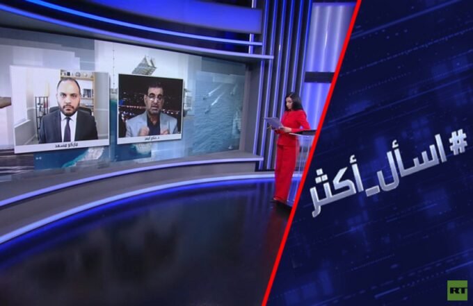 صورة لمضيق هرمز تظهر ناقلات نفط وسفناً حربية، تعكس التوترات الجيوسياسية في الممر المائي الحيوي.