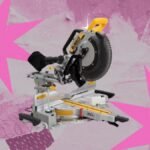 DeWalt 20-volt 12-inch cordless double bevel sliding compound miter saw on a workbench.