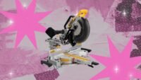 DeWalt 20-volt 12-inch cordless double bevel sliding compound miter saw on a workbench.