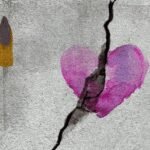 A woman looking thoughtfully into the distance, symbolizing reflection and new beginnings after a divorce.