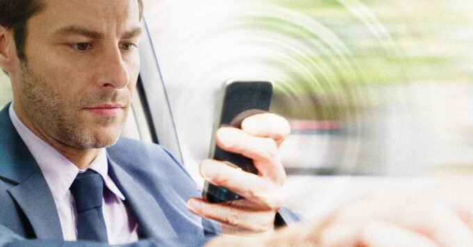 Smartphone next to an NFC tag or QR code, symbolizing free distraction blocking
