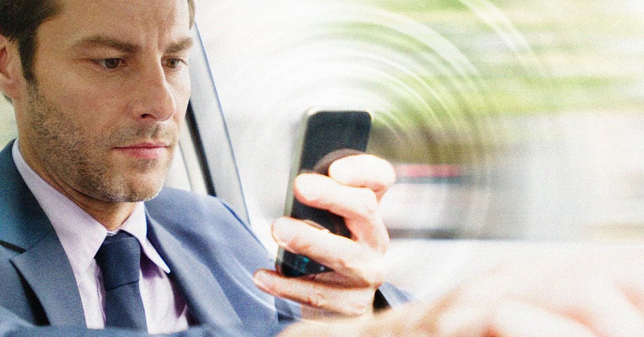 Smartphone next to an NFC tag or QR code, symbolizing free distraction blocking