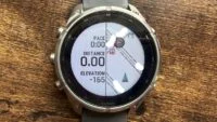 Close-up view of the Garmin Fenix 9 Pro Solar 47mm Titanium GPS Smartwatch on a wrist, displaying a map or activity data.