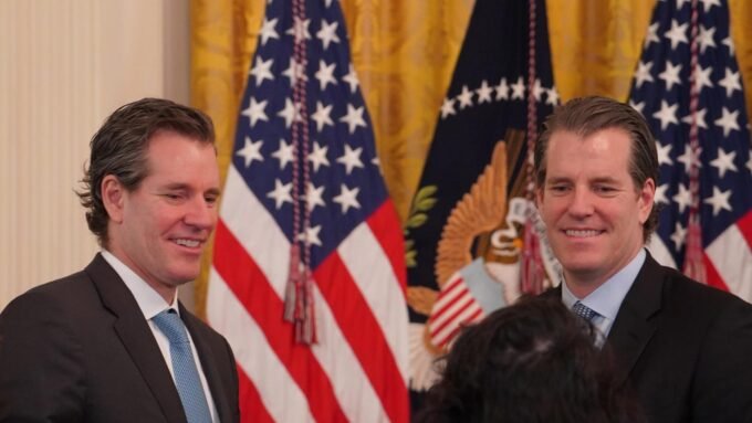 Cameron and Tyler Winklevoss at the White House after the GENIUS Act signing.