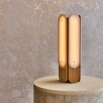 Hollis+Morris Beaufort lighting collection showcasing various pendants, sconces, and table lamps made from wood and sandblasted acrylic.