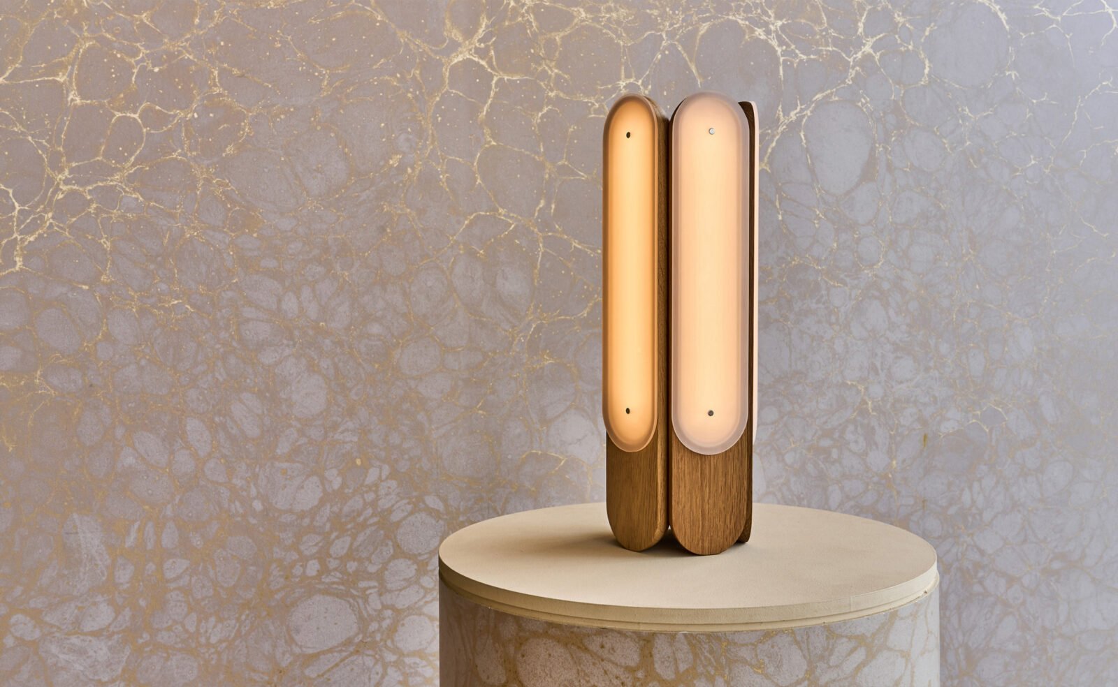 Hollis+Morris Beaufort lighting collection showcasing various pendants, sconces, and table lamps made from wood and sandblasted acrylic.