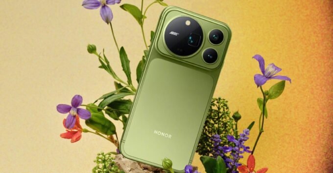 Honor Magic 9 Pro Max smartphone in mossy green, showcasing its large circular camera module.