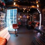 Engineers Trent Bateman, David Hirschfield, and Greg Grusby standing in the Star Wars Rebel Hideout at Industrial Light & Magic.