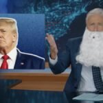 Jon Stewart with a long white beard, looking exasperated at The Daily Show desk