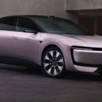 Le Paradoxe Audi : Quand le Constructeur Poursuit Ses Propres Créations Chinoises en Allemagne 8 Une AUDI E5 Sportback, voiture électrique chinoise, sur une route urbaine, illustrant le conflit d'importation.