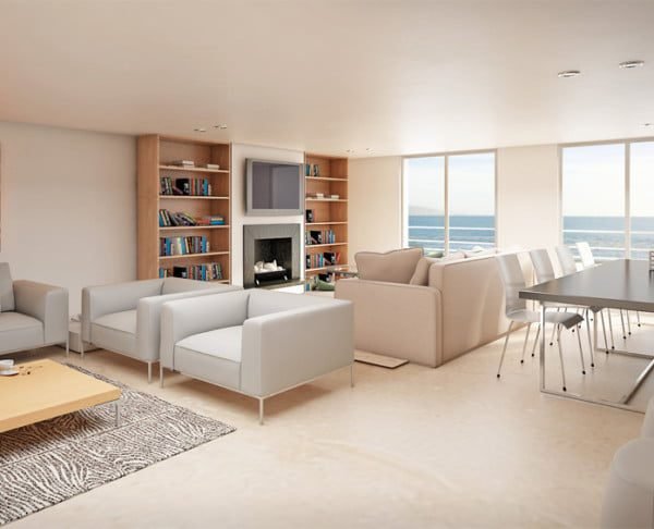 Vue aérienne d'un quartier résidentiel moderne au Maroc, avec des immeubles neufs et des grues de construction en arrière-plan, symbolisant le défi de l'accès au logement.