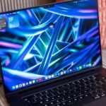 macOS Golden Gate: Apple's Latest OS Ushers in a Smarter, Sharper Experience 6 Screenshot of macOS 27 Golden Gate desktop with Siri AI interface and Liquid Glass effects
