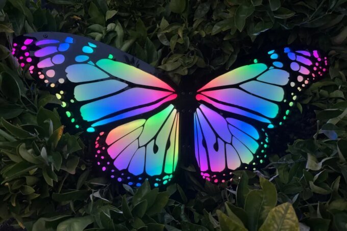 A vibrant collage representing innovation, featuring elements like an AI-powered butterfly, radio waves, and crafting tools, symbolizing the diverse exhibits at Maker Faire Bay Area 2026.