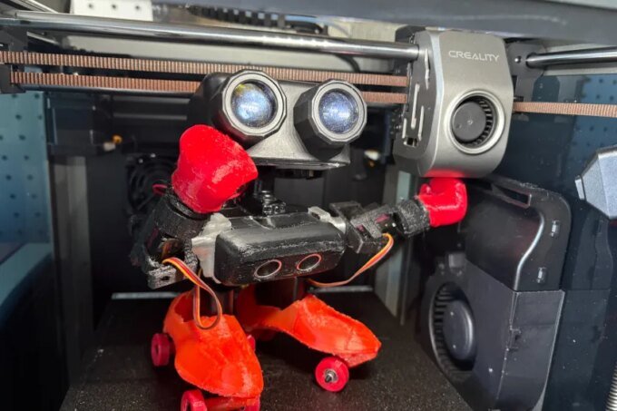 Diverse robots and tech enthusiasts interacting at Maker Faire Bay Area in the Foundry