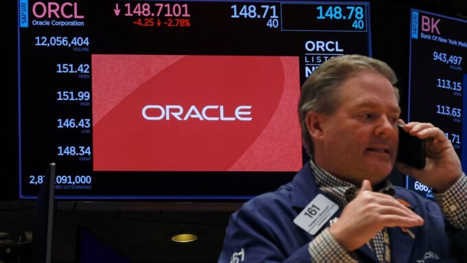 An Oracle logo displayed on a trading screen at the New York Stock Exchange, reflecting the company's stock performance.