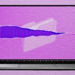 Laptop screen displaying a paper-like texture overlay from the Paperman app, showing text on a textured background.