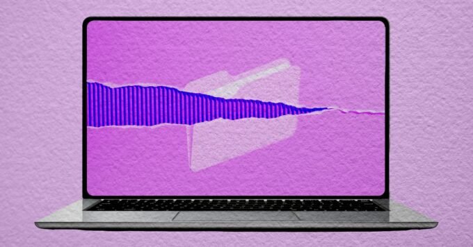 Laptop screen displaying a paper-like texture overlay from the Paperman app, showing text on a textured background.