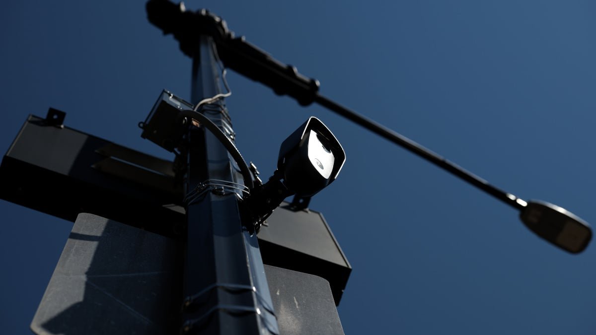 Automatic License Plate Reader (ALPR) camera, symbolizing the ongoing debate over police surveillance and data privacy.