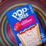 Pop-Tarts BuzzBallz cocktails with Pop-Tarts pastries in the background, illustrating the controversial brand collaboration.