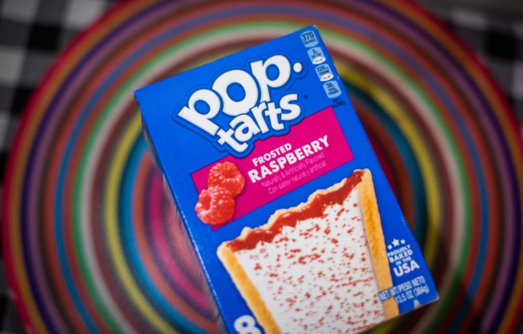 Pop-Tarts BuzzBallz cocktails with Pop-Tarts pastries in the background, illustrating the controversial brand collaboration.