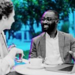 The Entrepreneur's Edge: Navigating Private Capital for Enduring Wealth 3 A diverse group of entrepreneurs discussing investment strategies around a table, symbolizing private capital collaboration.