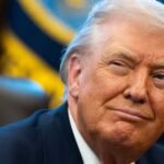 President Donald Trump flanked by tech CEOs Jensen Huang and Elon Musk, announcing the 'Super Intelligence' executive order.