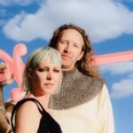 Sylvan Esso Unpack Ow ∞: From Nostalgic Beats to Food Replicators and the Perfect Yogurt 6 Sylvan Esso, Amelia Meath and Nick Sanborn, preparing for a frutiger aero renfaire, promoting their new album Ow ∞.
