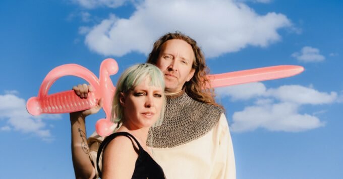 Sylvan Esso Unpack Ow ∞: From Nostalgic Beats to Food Replicators and the Perfect Yogurt 9 Sylvan Esso, Amelia Meath and Nick Sanborn, preparing for a frutiger aero renfaire, promoting their new album Ow ∞.