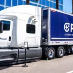 Two large semi-trailers, possibly with PlusAI and Nvidia logos, filled with sand, recovered after a theft attempt.